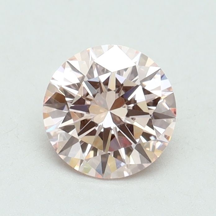 Loose Diamond - ROUND 0.72ct Fancy Intense Pink VS1: Loose Diamond - ROUND 0.72ct Fancy Intense Pink VS1 Source: This is a real non-mined Diamond that has been grown in a lab Shape: ROUND Carats: 0.72 Color: Fancy Intense Pink Certification: IGI Video: