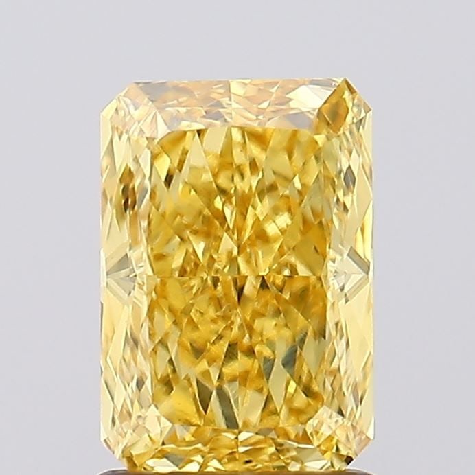 Loose Diamond - RADIANT 1.34ct Fancy Vivid Yellow VS1: Loose Diamond - RADIANT 1.34ct Fancy Vivid Yellow VS1 Source: This is a real non-mined Diamond that has been grown in a lab Shape: RADIANT Carats: 1.34 Color: Fancy Vivid Yellow Certification: IGI Vid