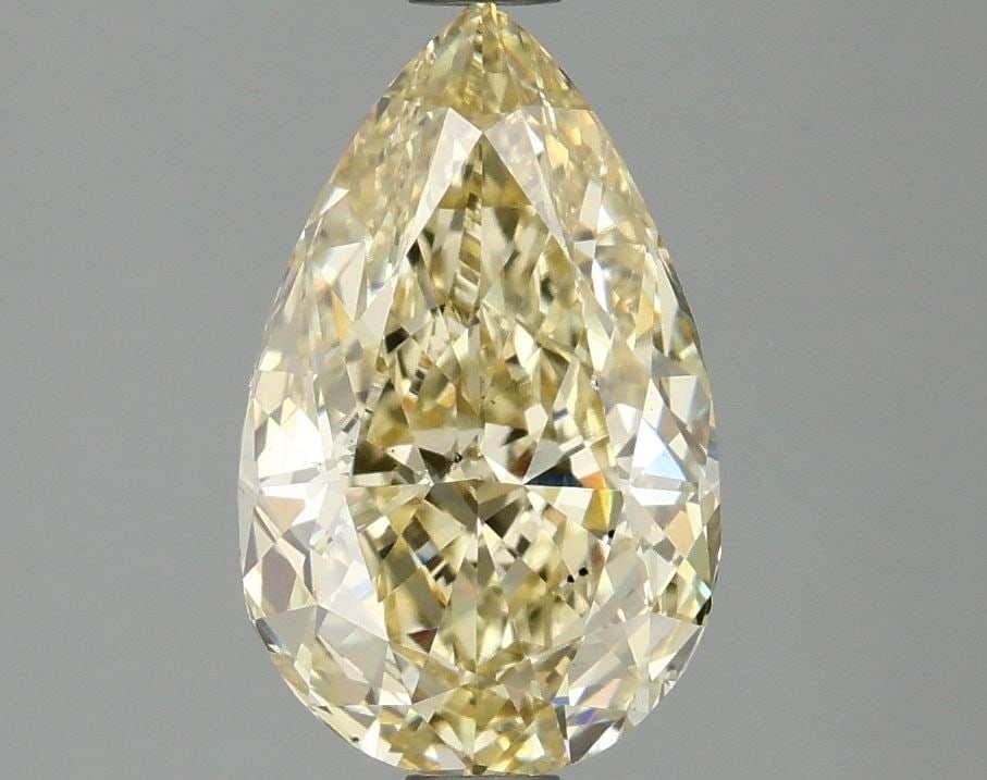 Loose Diamond - PEAR 2.1ct Fancy Yellow VS2: Loose Diamond - PEAR 2.1ct Fancy Yellow VS2 Source: This is a real non-mined Diamond that has been grown in a lab Shape: PEAR Carats: 2.1 Color: Fancy Yellow Certification: IGI Video: