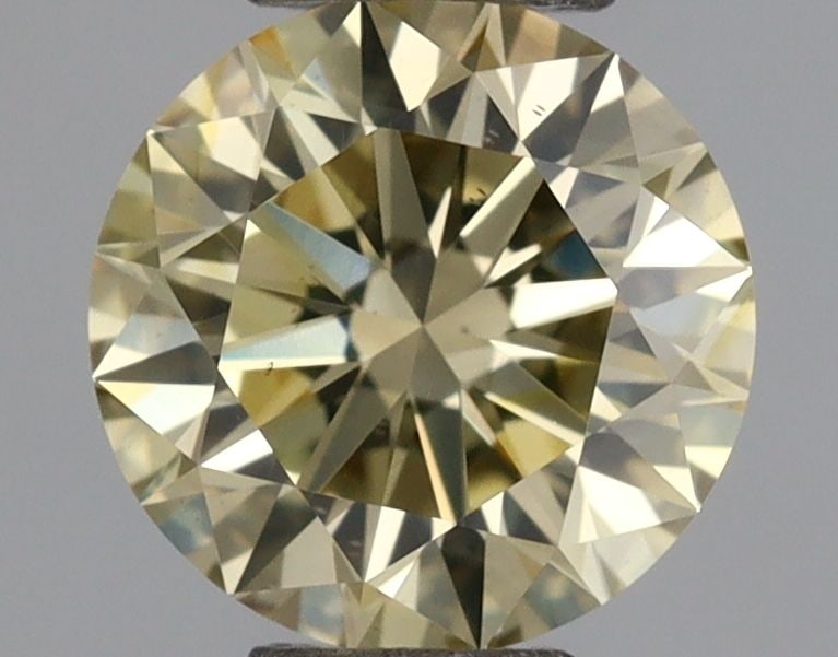 Loose Diamond - ROUND 0.6ct Fancy Vivid Yellow VS2: Loose Diamond - ROUND 0.6ct Fancy Vivid Yellow VS2 Source: This is a real non-mined Diamond that has been grown in a lab Shape: ROUND Carats: 0.6 Color: Fancy Vivid Yellow Certification: NONE Video:
