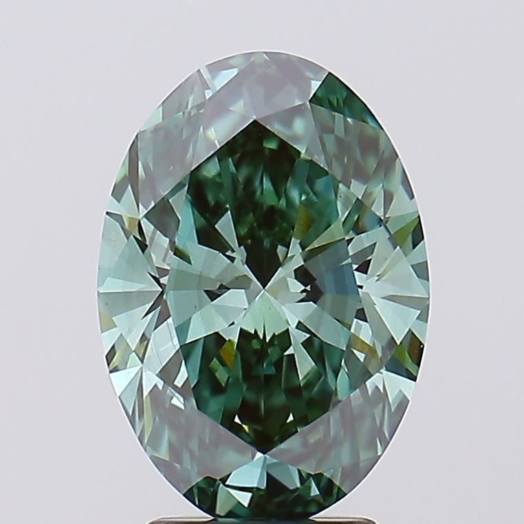 Loose Diamond - OVAL 3.32ct Fancy Vivid Green VS2: Loose Diamond - OVAL 3.32ct Fancy Vivid Green VS2 Source: This is a real non-mined Diamond that has been grown in a lab Shape: OVAL Carats: 3.32 Color: Fancy Vivid Green Certification: IGI Video: