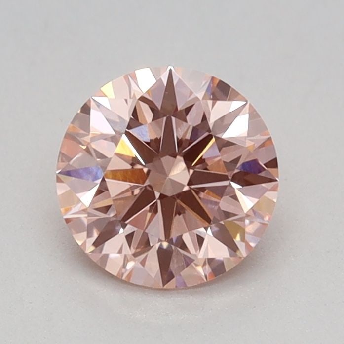 Ideal Loose Diamond - ROUND 0.56ct Fancy Vivid Pink VVS2: Ideal Loose Diamond - ROUND 0.56ct Fancy Vivid Pink VVS2 Source: This is a real non-mined Diamond that has been grown in a lab Shape: ROUND Carats: 0.56 Color: Fancy Vivid Pink Certification: IGI Vide