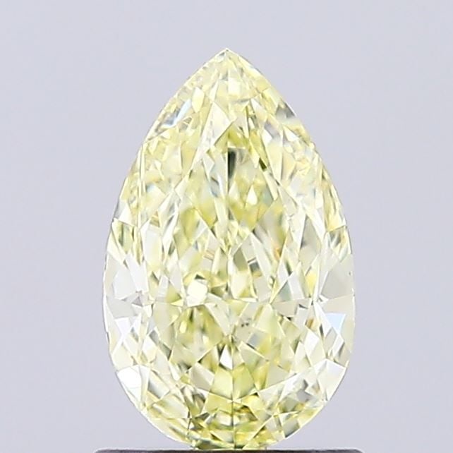 Loose Diamond - PEAR 0.95ct Fancy Yellow VS1: Loose Diamond - PEAR 0.95ct Fancy Yellow VS1 Source: This is a real non-mined Diamond that has been grown in a lab Shape: PEAR Carats: 0.95 Color: Fancy Yellow Certification: IGI Video: