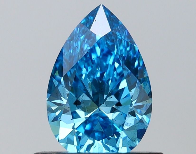 Loose Diamond - PEAR 0.81ct Fancy Vivid Blue SI2: Loose Diamond - PEAR 0.81ct Fancy Vivid Blue SI2 Source: This is a real non-mined Diamond that has been grown in a lab Shape: PEAR Carats: 0.81 Color: Fancy Vivid Blue Certification: IGI Video: