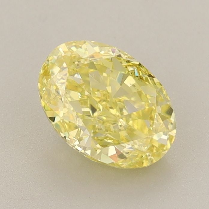 Loose Diamond - OVAL 1.1ct Fancy Vivid Yellow VS2: Loose Diamond - OVAL 1.1ct Fancy Vivid Yellow VS2 Source: This is a real non-mined Diamond that has been grown in a lab Shape: OVAL Carats: 1.1 Color: Fancy Vivid Yellow Certification: IGI Video:
