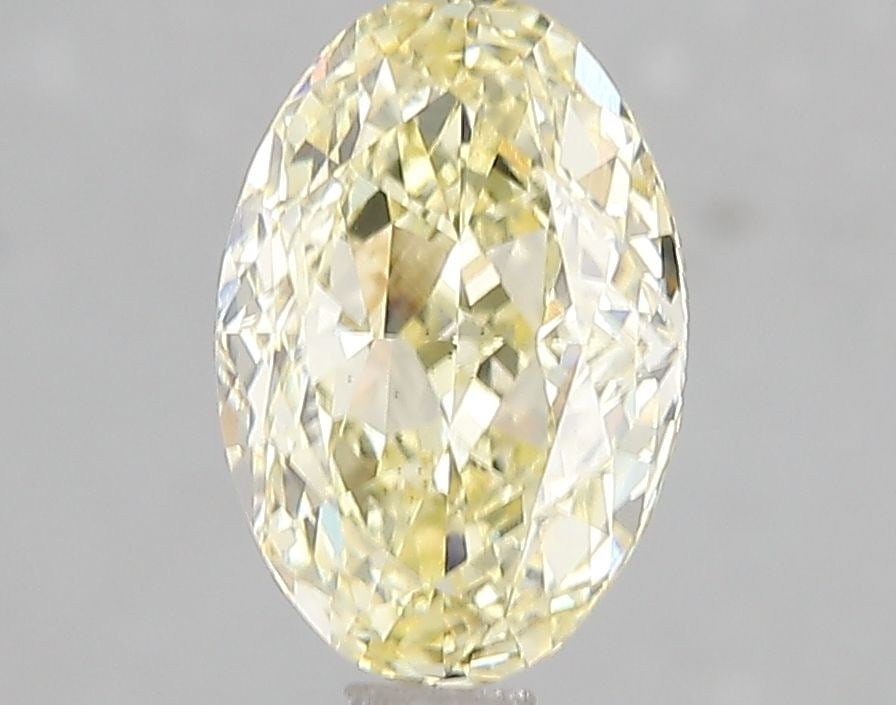 Loose Diamond - OVAL 2.06ct Fancy Yellow VS2: Loose Diamond - OVAL 2.06ct Fancy Yellow VS2 Source: This is a real non-mined Diamond that has been grown in a lab Shape: OVAL Carats: 2.06 Color: Fancy Yellow Certification: IGI Video: