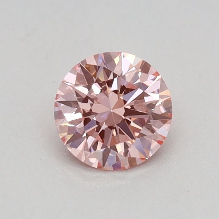 Ideal Loose Diamond - ROUND 0.32ct Fancy Vivid Pink VS1: Ideal Loose Diamond - ROUND 0.32ct Fancy Vivid Pink VS1 Source: This is a real non-mined Diamond that has been grown in a lab Shape: ROUND Carats: 0.32 Color: Fancy Vivid Pink Certification: IGI Video