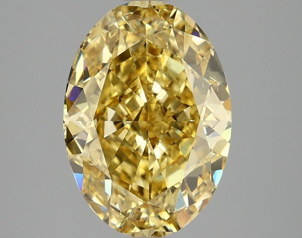 Loose Diamond - OVAL 4.08ct Fancy Vivid Yellow VS2: Loose Diamond - OVAL 4.08ct Fancy Vivid Yellow VS2 Source: This is a real non-mined Diamond that has been grown in a lab Shape: OVAL Carats: 4.08 Color: Fancy Vivid Yellow Certification: IGI Video: