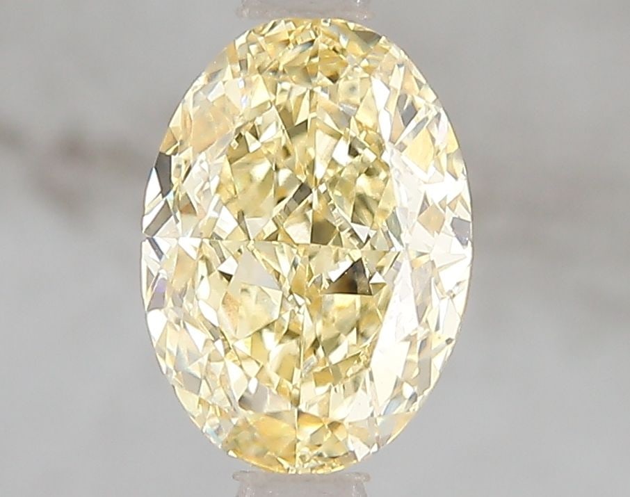 Loose Diamond - OVAL 2.08ct Fancy Intense Yellow VS1: Loose Diamond - OVAL 2.08ct Fancy Intense Yellow VS1 Source: This is a real non-mined Diamond that has been grown in a lab Shape: OVAL Carats: 2.08 Color: Fancy Intense Yellow Certification: IGI Video