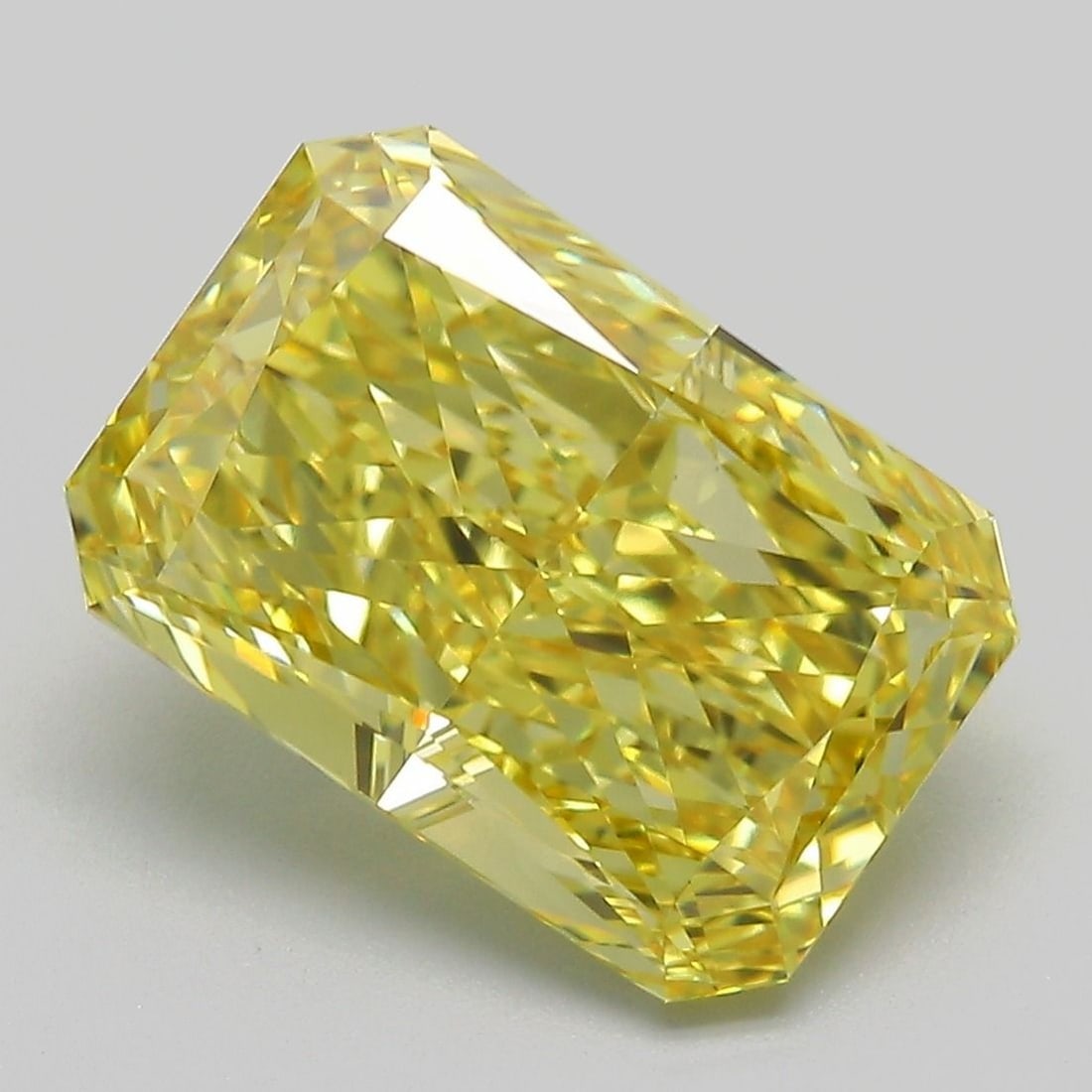 Loose Diamond - RADIANT 5.02ct Fancy Vivid Yellow VVS2: Loose Diamond - RADIANT 5.02ct Fancy Vivid Yellow VVS2 Source: This is a real non-mined Diamond that has been grown in a lab Shape: RADIANT Carats: 5.02 Color: Fancy Vivid Yellow Certification: IGI Vi