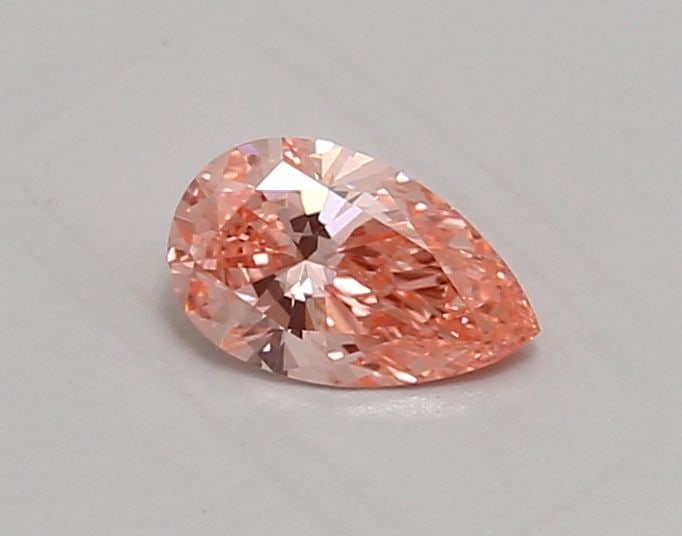 Loose Diamond - PEAR 0.6ct Fancy Vivid Pink VVS2: Loose Diamond - PEAR 0.6ct Fancy Vivid Pink VVS2 Source: This is a real non-mined Diamond that has been grown in a lab Shape: PEAR Carats: 0.6 Color: Fancy Vivid Pink Certification: IGI Video: