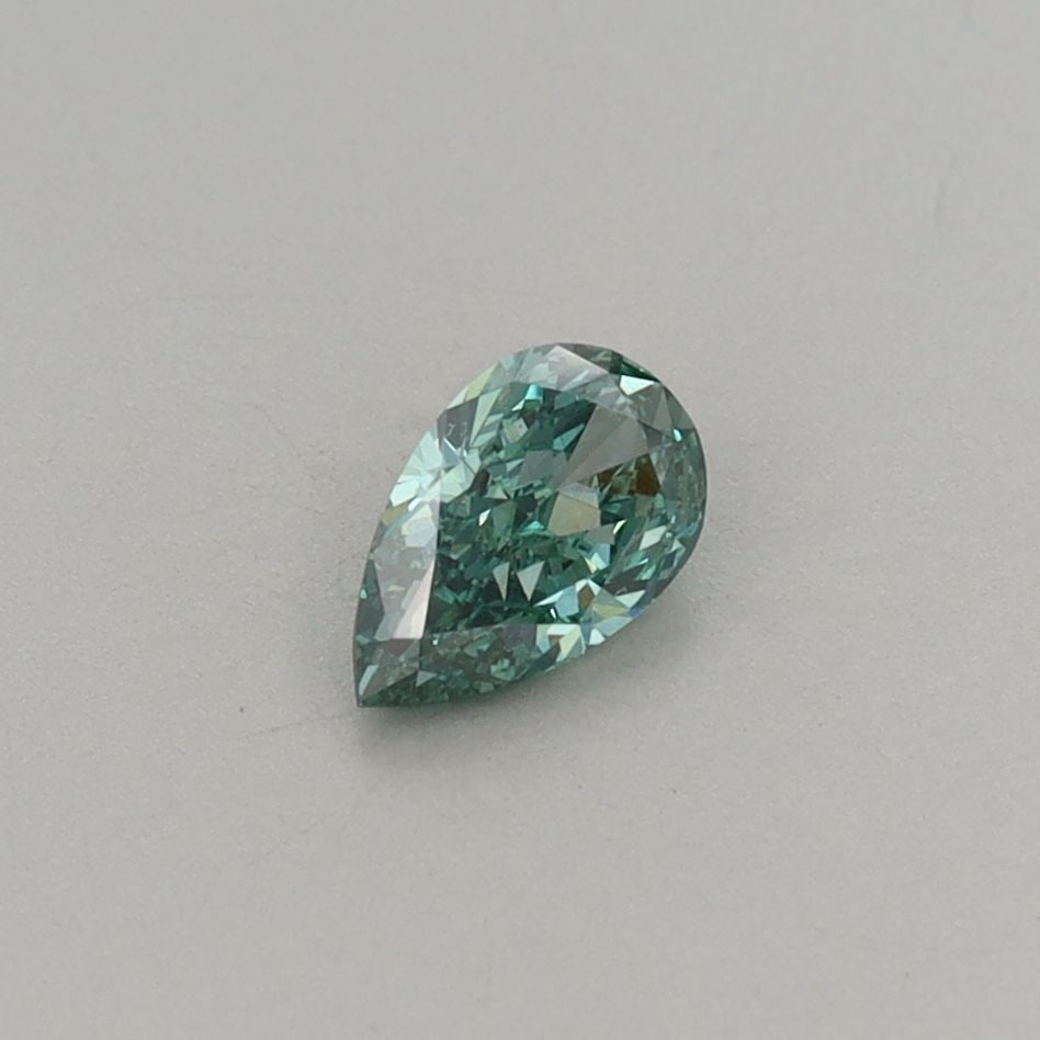 Loose Diamond - PEAR 0.32ct Fancy Vivid Green VVS2: Loose Diamond - PEAR 0.32ct Fancy Vivid Green VVS2 Source: This is a real non-mined Diamond that has been grown in a lab Shape: PEAR Carats: 0.32 Color: Fancy Vivid Green Certification: IGI Video: