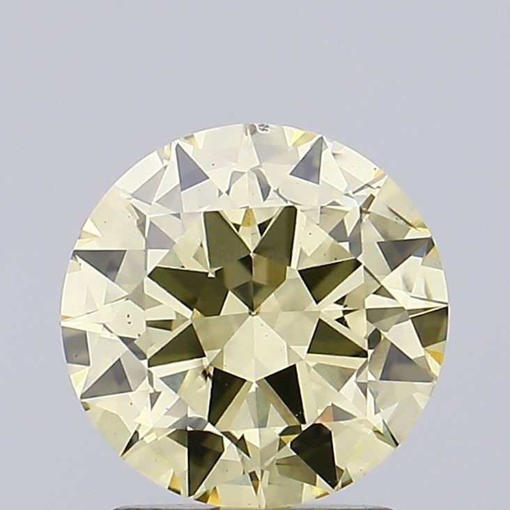 Loose Diamond - ROUND 1.51ct Fancy Yellow VS2: Loose Diamond - ROUND 1.51ct Fancy Yellow VS2 Source: This is a real non-mined Diamond that has been grown in a lab Shape: ROUND Carats: 1.51 Color: Fancy Yellow Certification: IGI Video:
