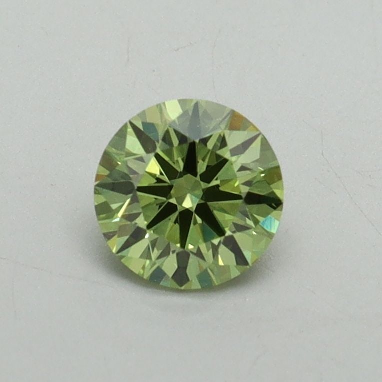 Ideal Loose Diamond - ROUND 0.54ct Fancy Vivid Green VS2: Ideal Loose Diamond - ROUND 0.54ct Fancy Vivid Green VS2 Source: This is a real non-mined Diamond that has been grown in a lab Shape: ROUND Carats: 0.54 Color: Fancy Vivid Green Certification: IGI Vid