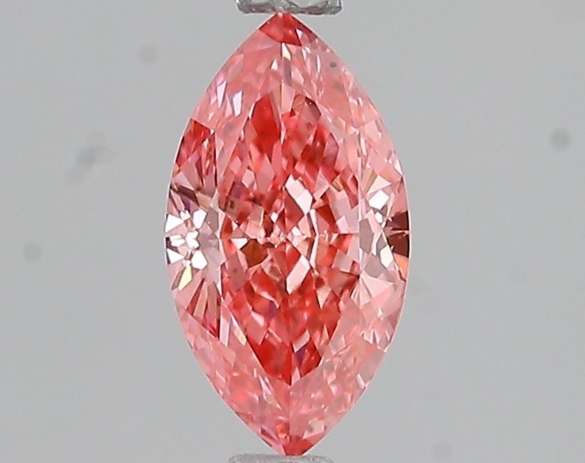 Loose Diamond - MARQUISE 1.02ct Fancy Vivid Pink VS2: Loose Diamond - MARQUISE 1.02ct Fancy Vivid Pink VS2 Source: This is a real non-mined Diamond that has been grown in a lab Shape: MARQUISE Carats: 1.02 Color: Fancy Vivid Pink Certification: IGI Video