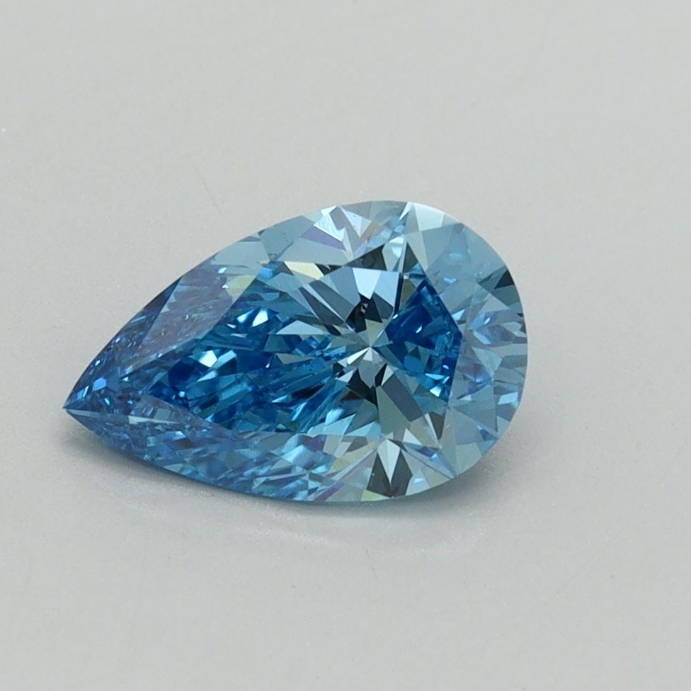 Loose Diamond - PEAR 1.06ct Fancy Vivid Blue VS1: Loose Diamond - PEAR 1.06ct Fancy Vivid Blue VS1 Source: This is a real non-mined Diamond that has been grown in a lab Shape: PEAR Carats: 1.06 Color: Fancy Vivid Blue Certification: IGI Video: