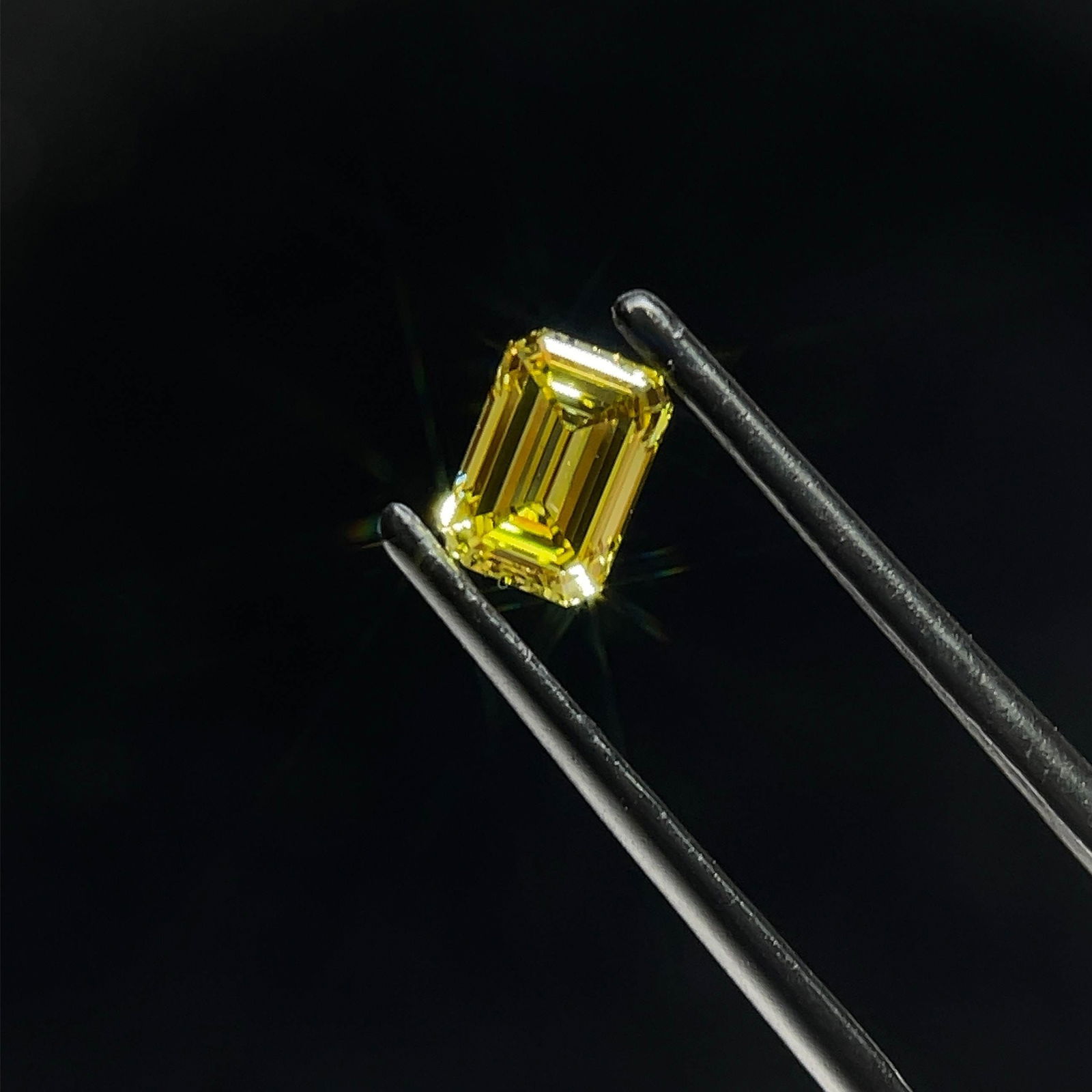 Loose Diamond - EMERALD 0.72ct Fancy Yellow VS2: Loose Diamond - EMERALD 0.72ct Fancy Yellow VS2 Source: This is a real non-mined Diamond that has been grown in a lab Shape: EMERALD Carats: 0.72 Color: Fancy Yellow Certification: IGI Video: Video