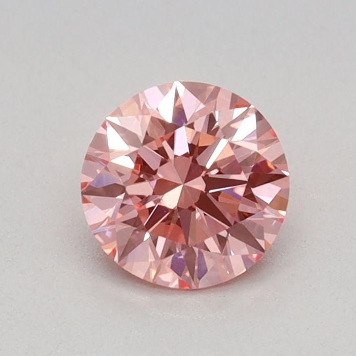 Ideal Loose Diamond - ROUND 0.42ct Fancy Vivid Pink VVS2: Ideal Loose Diamond - ROUND 0.42ct Fancy Vivid Pink VVS2 Source: This is a real non-mined Diamond that has been grown in a lab Shape: ROUND Carats: 0.42 Color: Fancy Vivid Pink Certification: IGI Vide