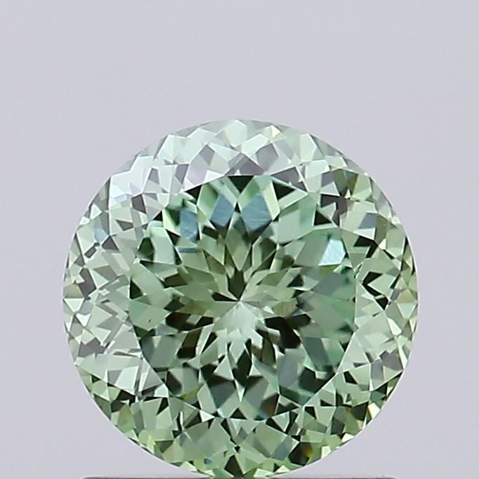 Loose Diamond - ROUND 0.92ct Fancy Vivid Green VS1: Loose Diamond - ROUND 0.92ct Fancy Vivid Green VS1 Source: This is a real non-mined Diamond that has been grown in a lab Shape: ROUND Carats: 0.92 Color: Fancy Vivid Green Certification: IGI Video: