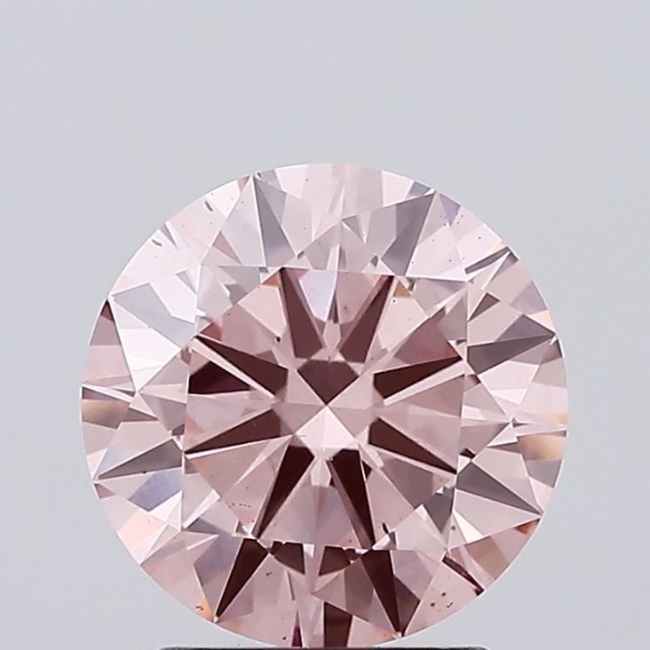 Loose Diamond - ROUND 1.87ct Fancy Vivid Pink VS2: Loose Diamond - ROUND 1.87ct Fancy Vivid Pink VS2 Source: This is a real non-mined Diamond that has been grown in a lab Shape: ROUND Carats: 1.87 Color: Fancy Vivid Pink Certification: IGI Video: