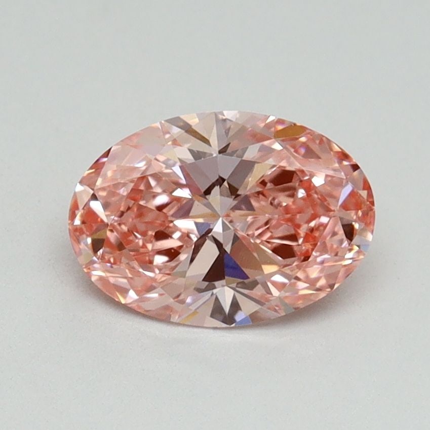 Loose Diamond - OVAL 1.0ct Fancy Vivid Pink VS1: Loose Diamond - OVAL 1.0ct Fancy Vivid Pink VS1 Source: This is a real non-mined Diamond that has been grown in a lab Shape: OVAL Carats: 1.0 Color: Fancy Vivid Pink Certification: IGI Video: