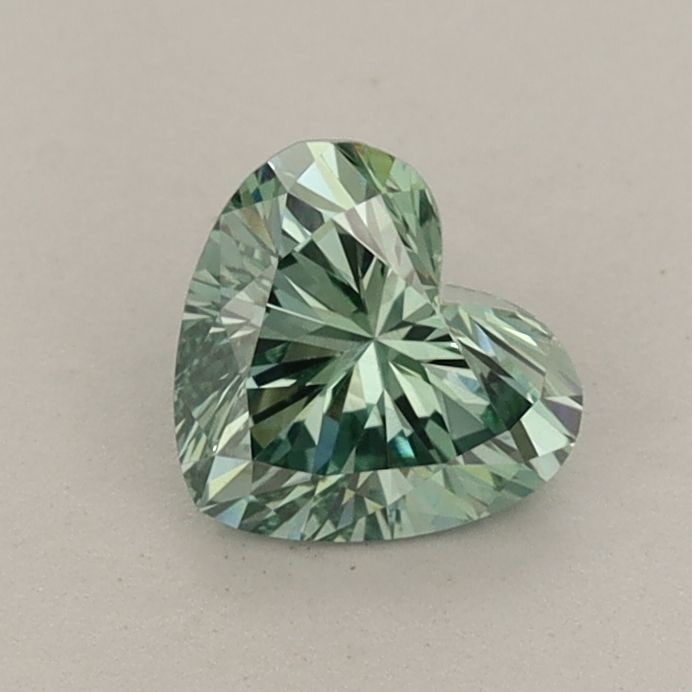 Loose Diamond - HEART 0.63ct Fancy Vivid Green VS1: Loose Diamond - HEART 0.63ct Fancy Vivid Green VS1 Source: This is a real non-mined Diamond that has been grown in a lab Shape: HEART Carats: 0.63 Color: Fancy Vivid Green Certification: IGI Video: