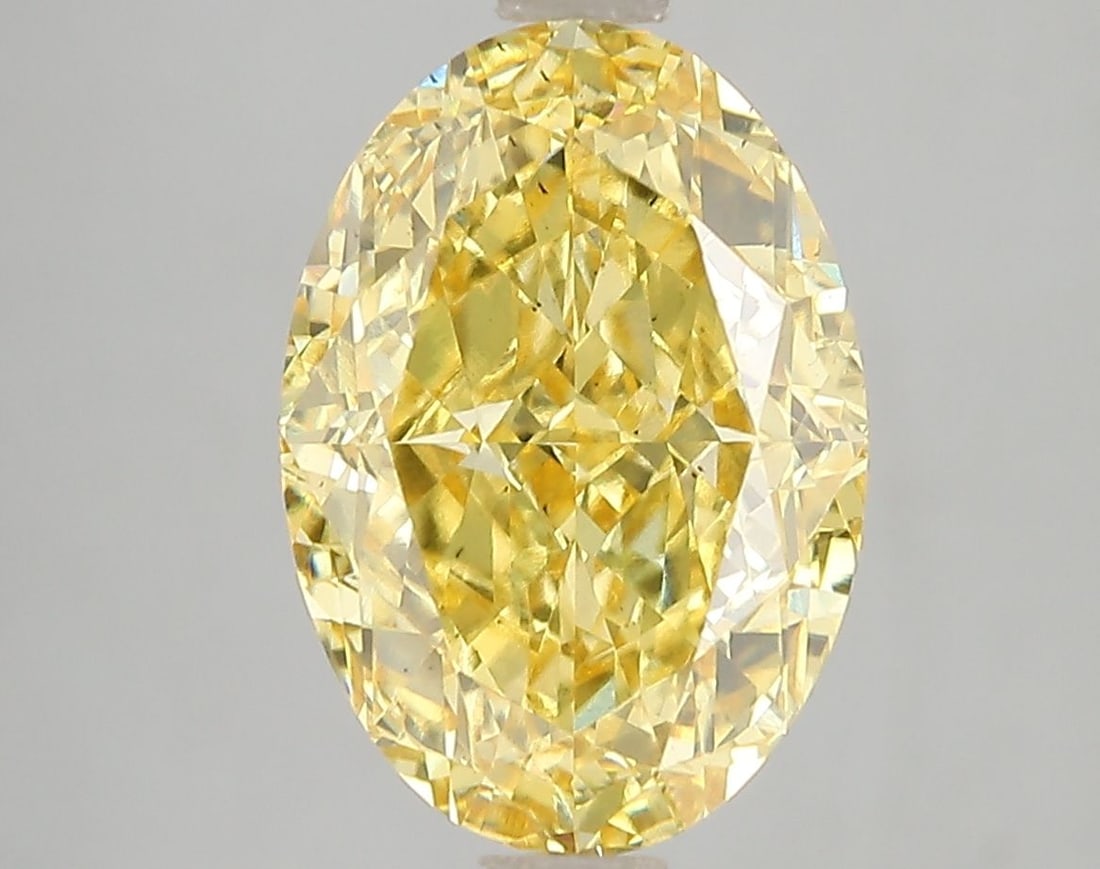 Loose Diamond - OVAL 5.04ct Fancy Vivid Yellow SI1: Loose Diamond - OVAL 5.04ct Fancy Vivid Yellow SI1 Source: This is a real non-mined Diamond that has been grown in a lab Shape: OVAL Carats: 5.04 Color: Fancy Vivid Yellow Certification: IGI Video: