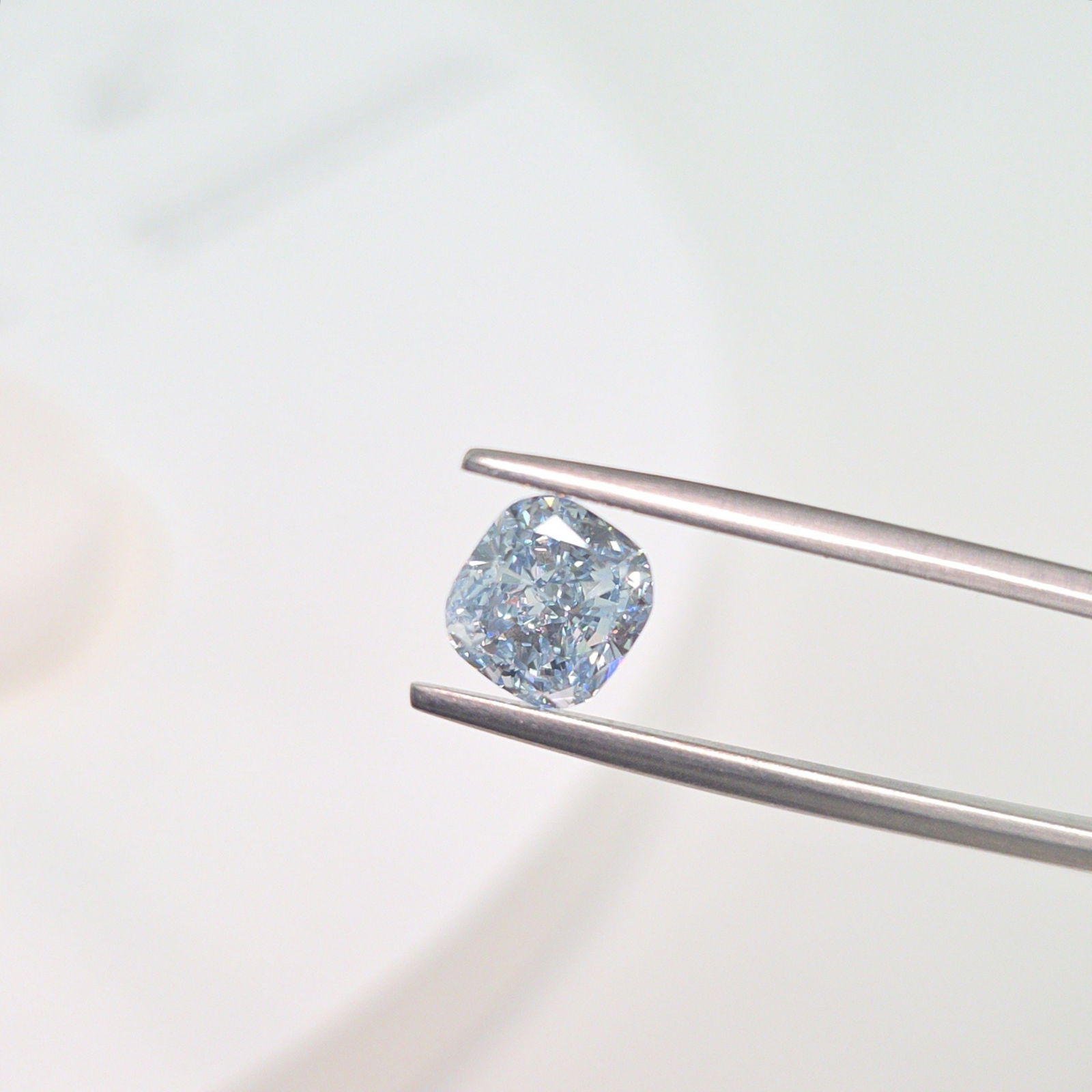 Loose Diamond - CUSHION MODIFIED 1.65ct Fancy Blue VVS2: Loose Diamond - CUSHION MODIFIED 1.65ct Fancy Blue VVS2 Source: This is a real non-mined Diamond that has been grown in a lab Shape: CUSHION MODIFIED Carats: 1.65 Color: Fancy Blue Certification: IGI
