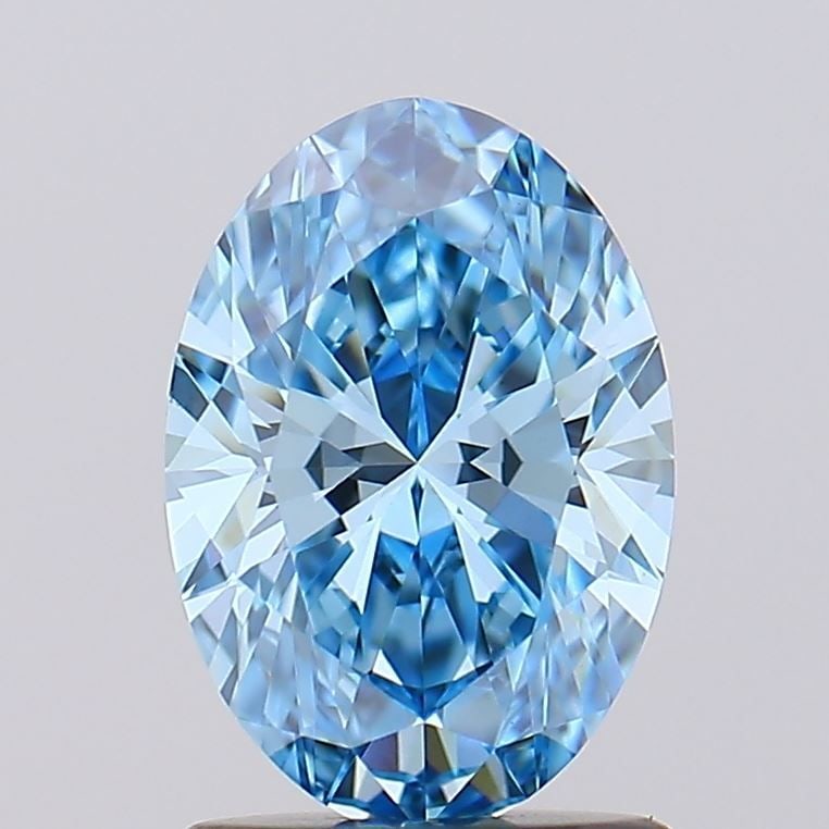 Loose Diamond - OVAL 1.27ct Fancy Vivid Blue VS1: Loose Diamond - OVAL 1.27ct Fancy Vivid Blue VS1 Source: This is a real non-mined Diamond that has been grown in a lab Shape: OVAL Carats: 1.27 Color: Fancy Vivid Blue Certification: IGI Video:
