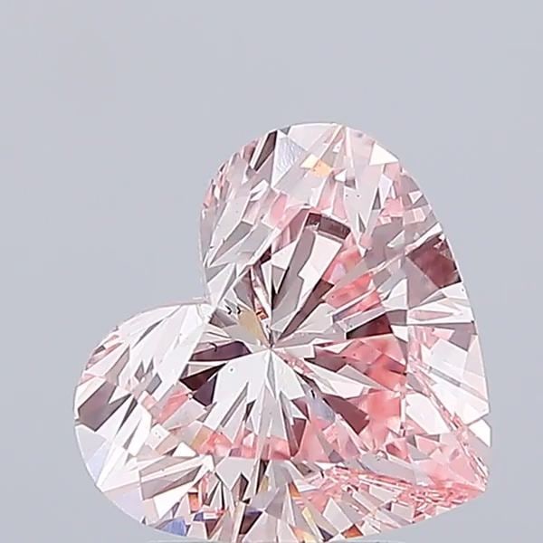 Loose Diamond - HEART 3.03ct Fancy Vivid Pink VS2: Loose Diamond - HEART 3.03ct Fancy Vivid Pink VS2 Source: This is a real non-mined Diamond that has been grown in a lab Shape: HEART Carats: 3.03 Color: Fancy Vivid Pink Certification: IGI Video: