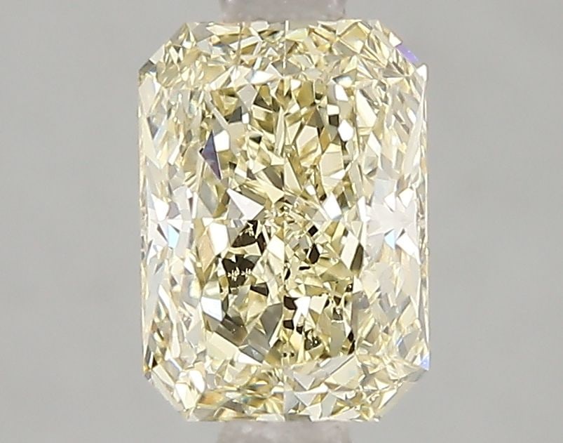 Loose Diamond - RADIANT 1.51ct Fancy Light Yellow SI1: Loose Diamond - RADIANT 1.51ct Fancy Light Yellow SI1 Source: This is a real non-mined Diamond that has been grown in a lab Shape: RADIANT Carats: 1.51 Color: Fancy Light Yellow Certification: IGI Vid