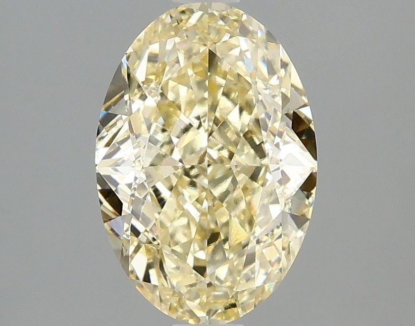 Loose Diamond - OVAL 2.09ct Fancy Yellow VVS2: Loose Diamond - OVAL 2.09ct Fancy Yellow VVS2 Source: This is a real non-mined Diamond that has been grown in a lab Shape: OVAL Carats: 2.09 Color: Fancy Yellow Certification: IGI Video: