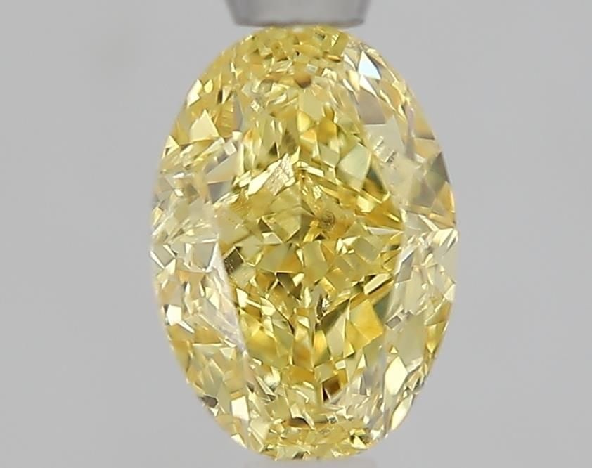 Loose Diamond - OVAL 1.1ct Fancy Intense Yellow VS2: Loose Diamond - OVAL 1.1ct Fancy Intense Yellow VS2 Source: This is a real non-mined Diamond that has been grown in a lab Shape: OVAL Carats: 1.1 Color: Fancy Intense Yellow Certification: IGI Video: