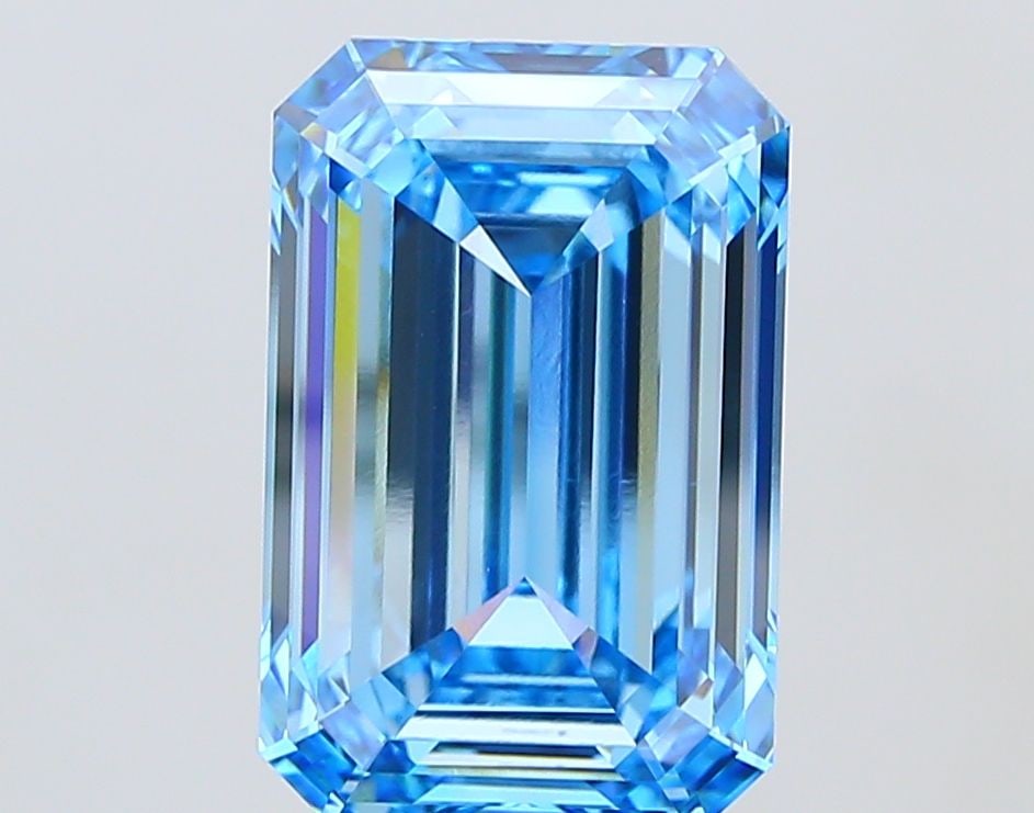 Loose Diamond - EMERALD 15.1ct Fancy Vivid Blue VS1: Loose Diamond - EMERALD 15.1ct Fancy Vivid Blue VS1 Source: This is a real non-mined Diamond that has been grown in a lab Shape: EMERALD Carats: 15.1 Color: Fancy Vivid Blue Certification: IGI Video: