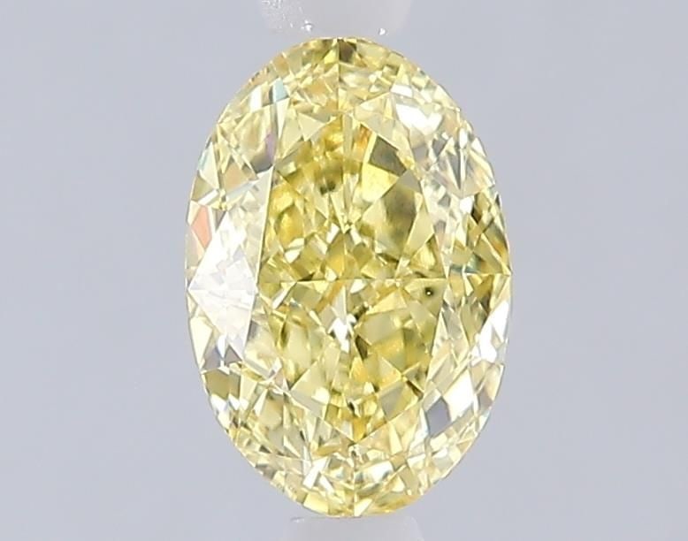 Loose Diamond - OVAL 1.09ct Fancy Vivid Yellow SI1: Loose Diamond - OVAL 1.09ct Fancy Vivid Yellow SI1 Source: This is a real non-mined Diamond that has been grown in a lab Shape: OVAL Carats: 1.09 Color: Fancy Vivid Yellow Certification: IGI Video: