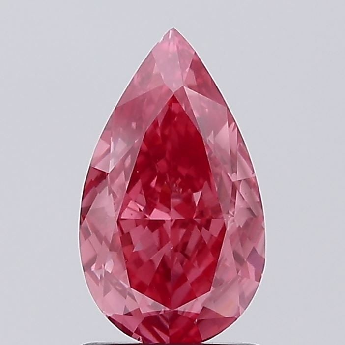 Loose Diamond - PEAR 1.7ct Fancy Vivid Pink VS1: Loose Diamond - PEAR 1.7ct Fancy Vivid Pink VS1 Source: This is a real non-mined Diamond that has been grown in a lab Shape: PEAR Carats: 1.7 Color: Fancy Vivid Pink Certification: IGI Video: