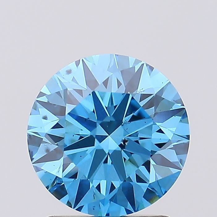 Ideal Loose Diamond - ROUND 1.55ct Fancy Vivid Blue SI1: Ideal Loose Diamond - ROUND 1.55ct Fancy Vivid Blue SI1 Source: This is a real non-mined Diamond that has been grown in a lab Shape: ROUND Carats: 1.55 Color: Fancy Vivid Blue Certification: IGI Video