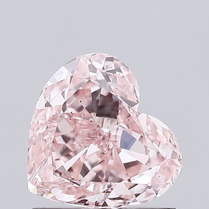 Loose Diamond - HEART 0.81ct Fancy Intense Pink VS2: Loose Diamond - HEART 0.81ct Fancy Intense Pink VS2 Source: This is a real non-mined Diamond that has been grown in a lab Shape: HEART Carats: 0.81 Color: Fancy Intense Pink Certification: IGI Video: