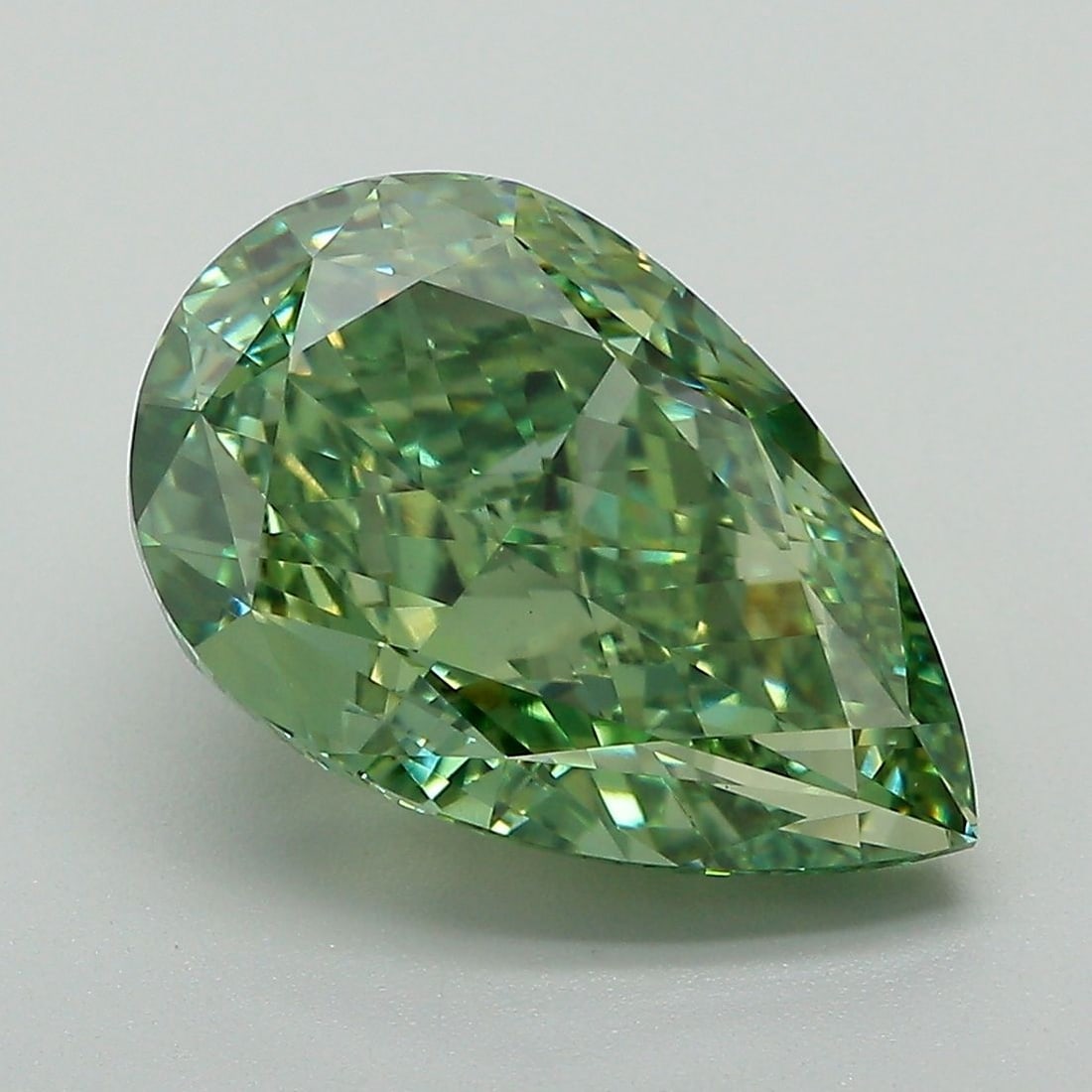 Loose Diamond - PEAR 5.13ct Fancy Vivid Green VS1: Loose Diamond - PEAR 5.13ct Fancy Vivid Green VS1 Source: This is a real non-mined Diamond that has been grown in a lab Shape: PEAR Carats: 5.13 Color: Fancy Vivid Green Certification: IGI Video: