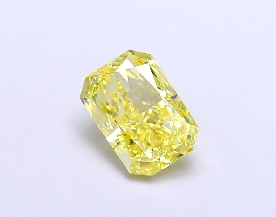 Loose Diamond - RADIANT 1.06ct Fancy Vivid Yellow IF: Loose Diamond - RADIANT 1.06ct Fancy Vivid Yellow IF Source: This is a real non-mined Diamond that has been grown in a lab Shape: RADIANT Carats: 1.06 Color: Fancy Vivid Yellow Certification: IGI Vide