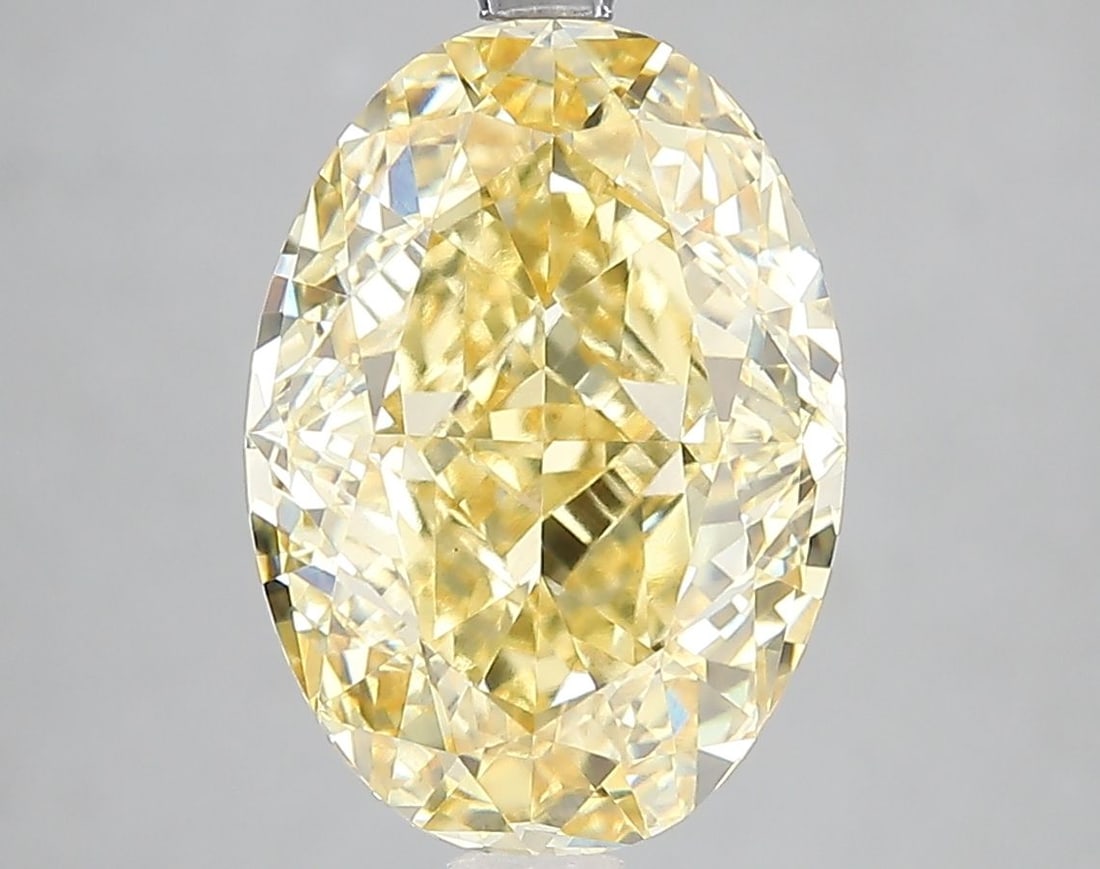 Loose Diamond - OVAL 5.42ct Fancy Vivid Yellow VVS2: Loose Diamond - OVAL 5.42ct Fancy Vivid Yellow VVS2 Source: This is a real non-mined Diamond that has been grown in a lab Shape: OVAL Carats: 5.42 Color: Fancy Vivid Yellow Certification: IGI Video:
