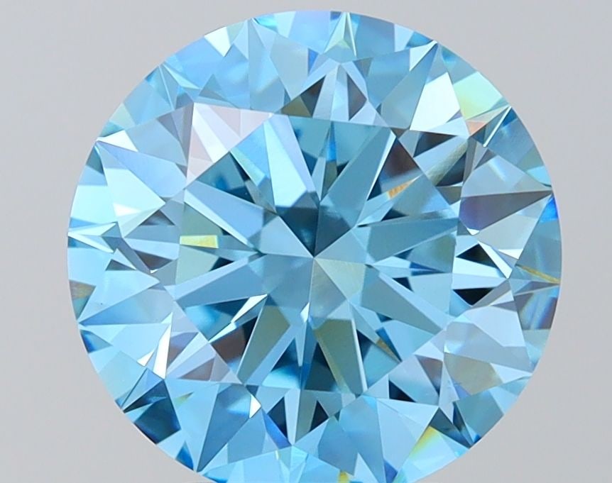 Ideal Loose Diamond - ROUND 4.0ct Fancy Vivid Blue VVS2: Ideal Loose Diamond - ROUND 4.0ct Fancy Vivid Blue VVS2 Source: This is a real non-mined Diamond that has been grown in a lab Shape: ROUND Carats: 4.0 Color: Fancy Vivid Blue Certification: IGI Video: