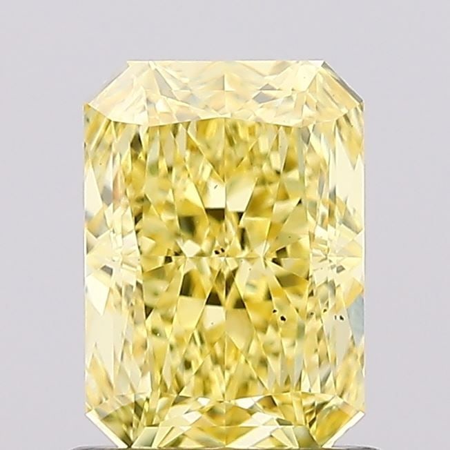 Loose Diamond - RADIANT 1.03ct Fancy Vivid Yellow VS2: Loose Diamond - RADIANT 1.03ct Fancy Vivid Yellow VS2 Source: This is a real non-mined Diamond that has been grown in a lab Shape: RADIANT Carats: 1.03 Color: Fancy Vivid Yellow Certification: IGI Vid