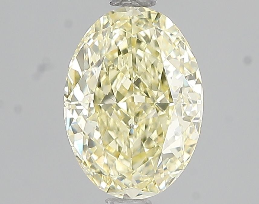 Loose Diamond - OVAL 2.04ct Fancy Yellow VS1: Loose Diamond - OVAL 2.04ct Fancy Yellow VS1 Source: This is a real non-mined Diamond that has been grown in a lab Shape: OVAL Carats: 2.04 Color: Fancy Yellow Certification: IGI Video: