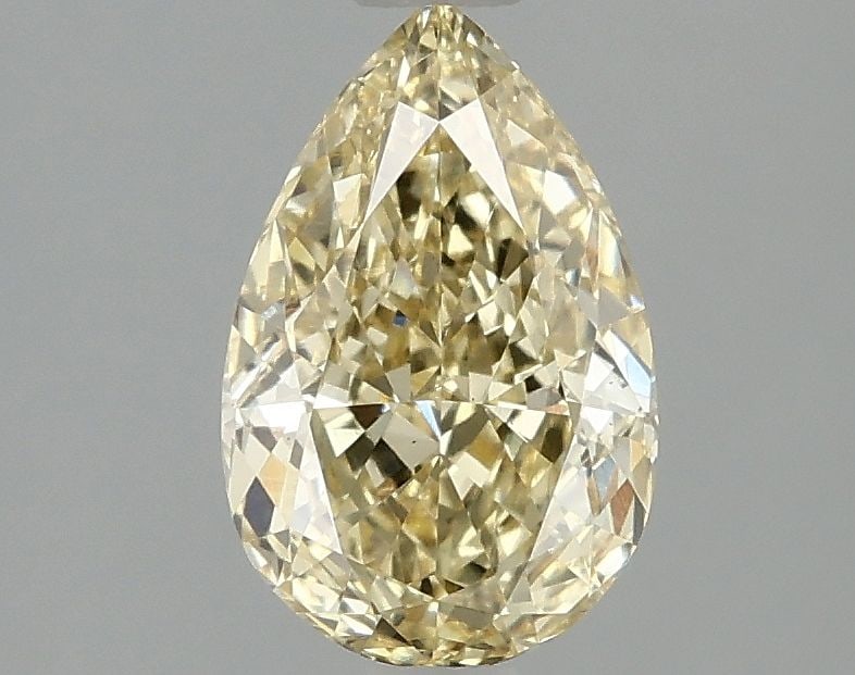 Loose Diamond - PEAR 1.57ct Fancy Vivid Yellow VS2: Loose Diamond - PEAR 1.57ct Fancy Vivid Yellow VS2 Source: This is a real non-mined Diamond that has been grown in a lab Shape: PEAR Carats: 1.57 Color: Fancy Vivid Yellow Certification: IGI Video: