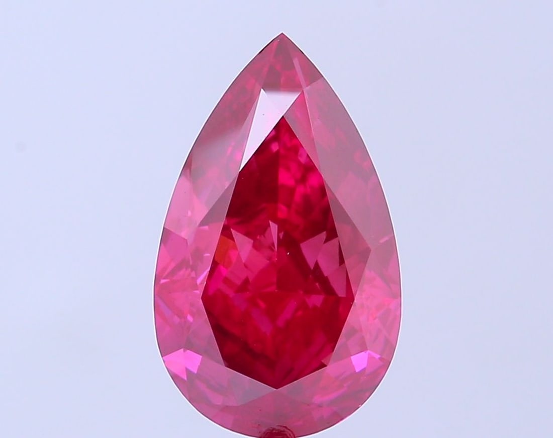 Loose Diamond - PEAR 5.25ct Fancy Vivid Pink VS2: Loose Diamond - PEAR 5.25ct Fancy Vivid Pink VS2 Source: This is a real non-mined Diamond that has been grown in a lab Shape: PEAR Carats: 5.25 Color: Fancy Vivid Pink Certification: IGI Video: