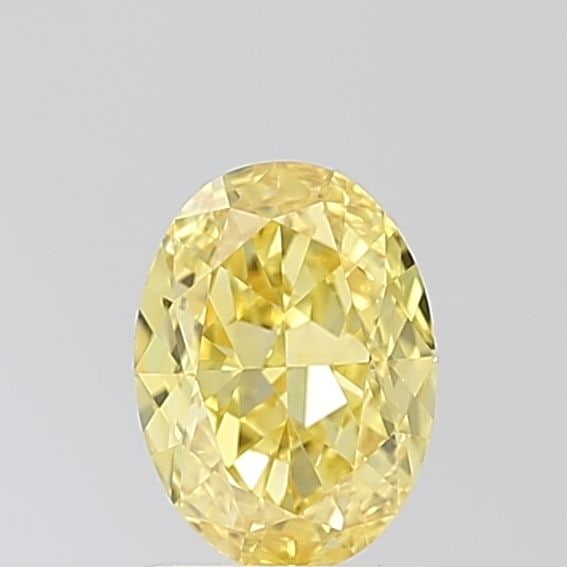 Loose Diamond - OVAL 1.08ct Fancy Vivid Yellow VVS2: Loose Diamond - OVAL 1.08ct Fancy Vivid Yellow VVS2 Source: This is a real non-mined Diamond that has been grown in a lab Shape: OVAL Carats: 1.08 Color: Fancy Vivid Yellow Certification: IGI Video: