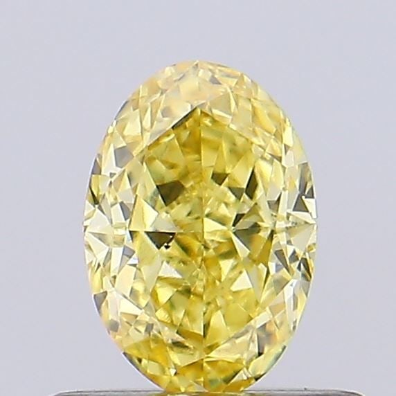 Loose Diamond - OVAL 0.56ct Fancy Intense Yellow VVS2: Loose Diamond - OVAL 0.56ct Fancy Intense Yellow VVS2 Source: This is a real non-mined Diamond that has been grown in a lab Shape: OVAL Carats: 0.56 Color: Fancy Intense Yellow Certification: IGI Vide