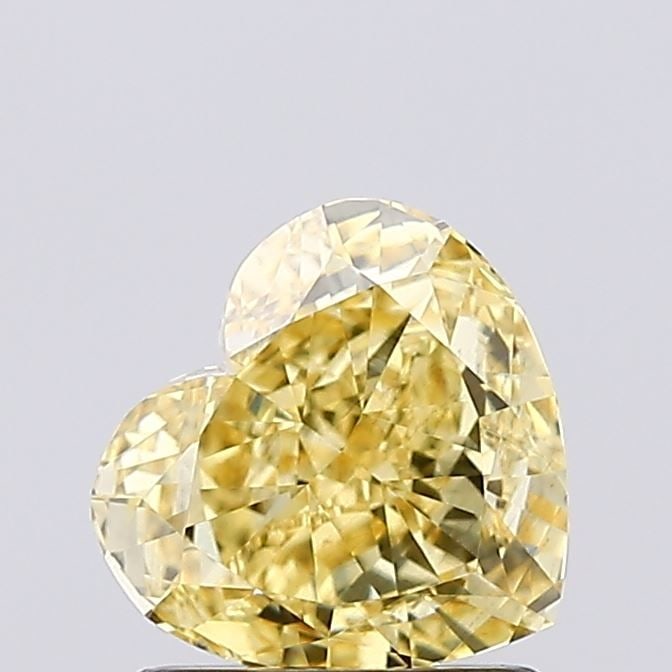 Loose Diamond - HEART 1.16ct Fancy Vivid Yellow VS2: Loose Diamond - HEART 1.16ct Fancy Vivid Yellow VS2 Source: This is a real non-mined Diamond that has been grown in a lab Shape: HEART Carats: 1.16 Color: Fancy Vivid Yellow Certification: IGI Video: