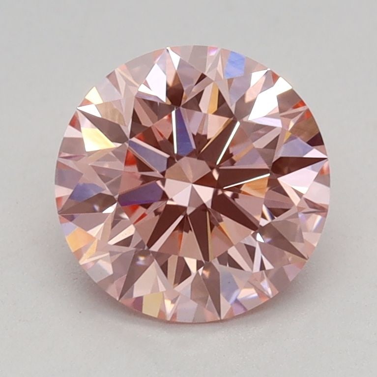 Ideal Loose Diamond - ROUND 1.11ct Fancy Intense Pink VVS2: Ideal Loose Diamond - ROUND 1.11ct Fancy Intense Pink VVS2 Source: This is a real non-mined Diamond that has been grown in a lab Shape: ROUND Carats: 1.11 Color: Fancy Intense Pink Certification: IGI